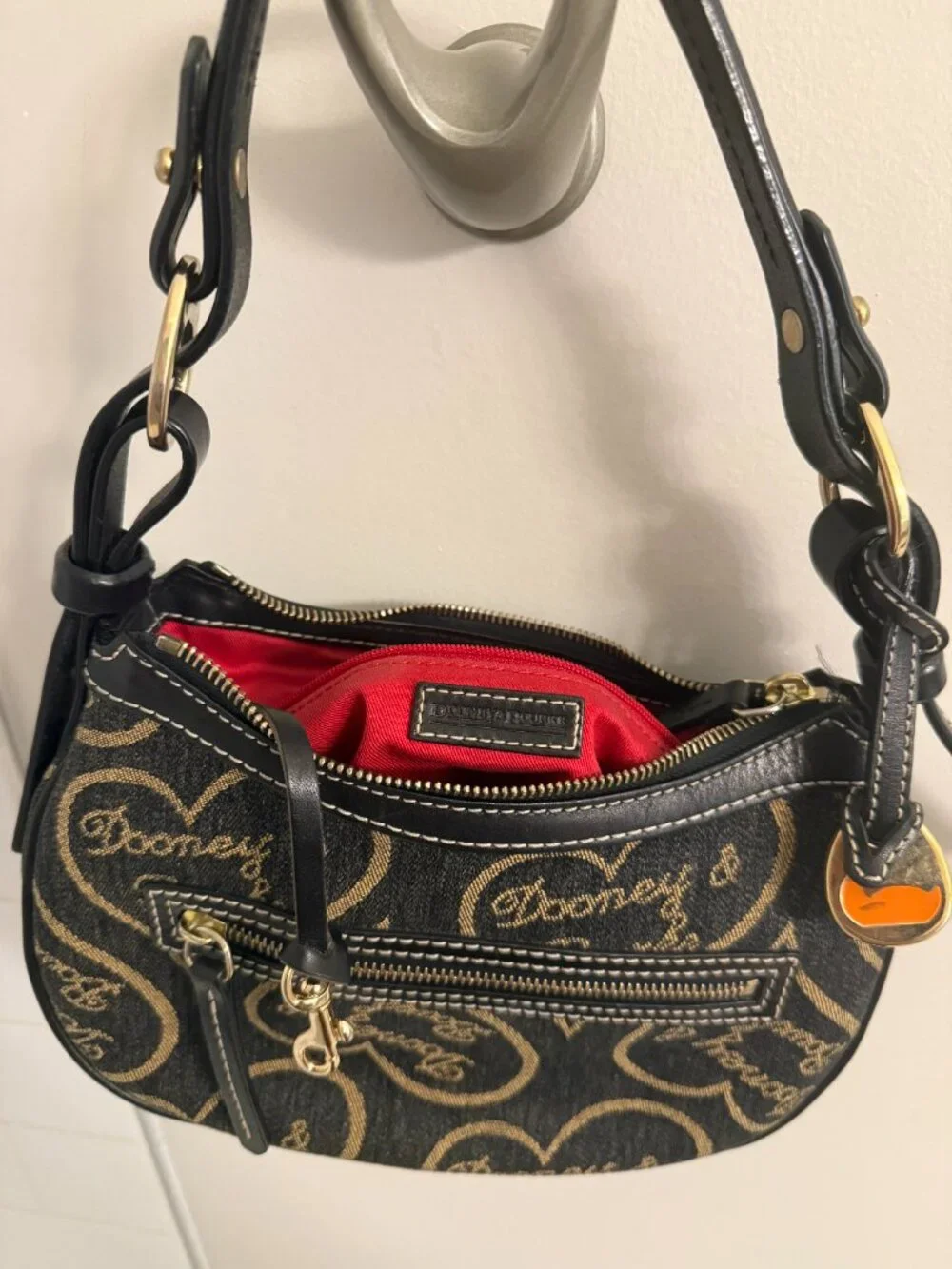 Dooney & Bourke Black Signature Canvas Mini Hobo Shoulder Bag.